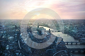 London sunset view from the Shard. Centre of London, London eye, River Thames with beautiful light reflection.