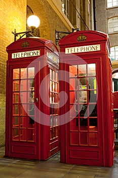 London symbol red phone box at illuminated street