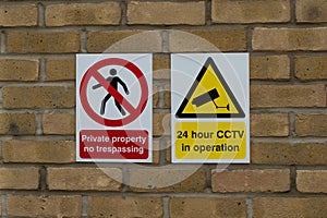 London UK 06.09.2021 Cctv sign and private property symbol on the wall. Video shooting warning