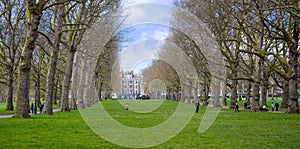 LONDON, UK - April16, 2016: - Brits chilling up in Green park ne