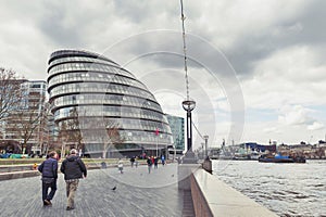 The curved glass building of the City Hall of London architectural landmark of London, located on the Southwark near Tower Bridge