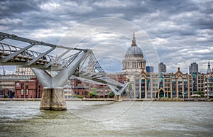 London, UK - August 8, 2016: The Millennium bridge and St Pauls cathedral