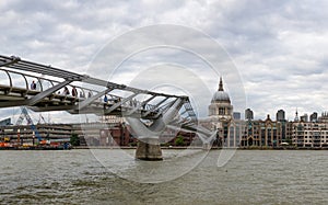 London, UK - August 8, 2016: The Millennium bridge and St Pauls cathedral