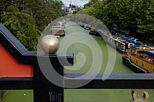 Grand Union Canal at Little Venice, Paddington, London. The water is covered in green algae after the summer heatwave, 2018