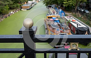 Grand Union Canal at Little Venice, Paddington, London. The water is covered in green algae after the summer heatwave, 2018