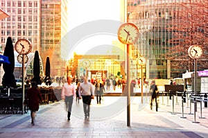 LONDON, UK - JULY 03, 2014: People walking to get to work at early morning in Canary Wharf aria