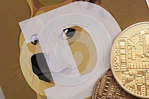 LONDON, UK - June 2021: Doge or dogecoin cryptocurrency logo on paper