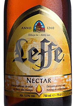 LONDON, UK - MARCH 10, 2018 : Cold bottle label of Leffe Nectar beer on white.Leffe is made by Abbaye de Leffe in Belgium.