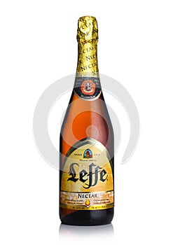 LONDON, UK - MARCH 10, 2018 : Cold bottle of Leffe Nectar beer on white.Leffe is made by Abbaye de Leffe in Belgium.