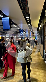 Travelers shopping at duty free shops at Heathrow airport