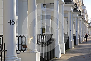 LONDON, UK - NOVEMBER 28, 2016: Row of white luxury houses facades in South Kensington