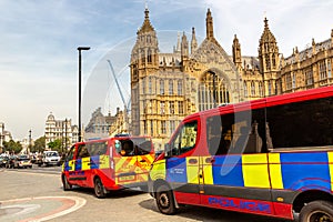 London Metropolitan Police van in front of Palace of Westminster in London