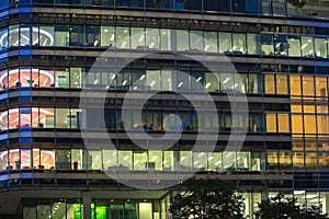 LONDON, UK - 7 SEPTEMBER, 2015: Office building in night light. Canary Wharf night life