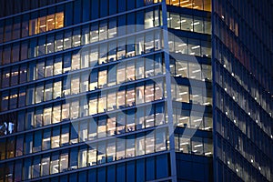 LONDON, UK - 7 SEPTEMBER, 2015: Office building in night light. Canary Wharf night life