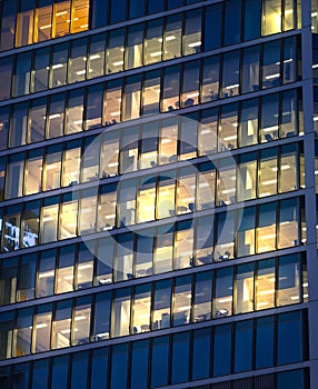 LONDON, UK - 7 SEPTEMBER, 2015: Office building in night light. Canary Wharf night life