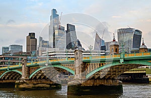 London, UK: Skyscrapers of the City of London with Southwark Bridge