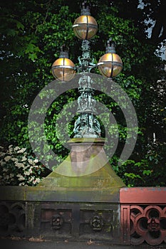 London, UK. Victorian style street lamp in Regent`s Park in city centre.