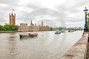 London - view of Thames river, Big Ben clock tower, Houses of Parliament.