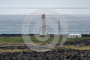 Londragar, Iceland, with Malariff Lighthouse. Snaefellsness Pensinsula.. photo