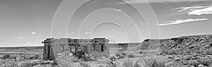 Lone adobe southwest home in Arizona USA - black and white