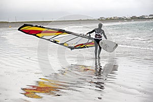 Lone Atlantic windsurfer getting ready to surf