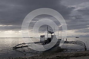Lone Banca Fishing Boat at Sunset, Panglao Island, Bohol, Philippines