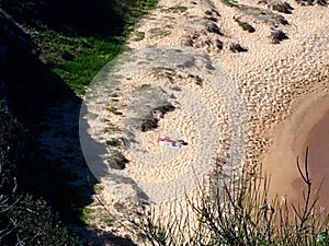 Lone bathed on beach at Narrabeen