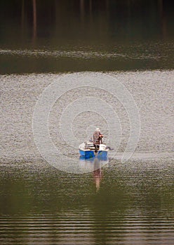 Lone boat angler.