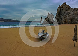 A lone boat on a secluded beach.