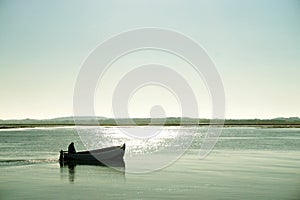 Lone boatman photo