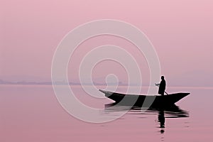 a lone fisherman on a boat, silhouetted against a soft pink dawn sky