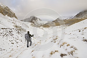 A lone hiker in the Alps.