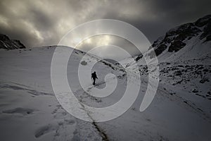 A lone hiker in the Alps.