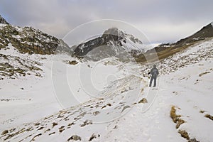 A lone hiker in the Alps.