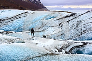 Lone man on a glacier