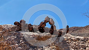 Lone Man lying on a rock in Kaokoveld