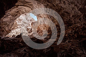 Lone man in Namakdan cave, Qeshm Island, Iran