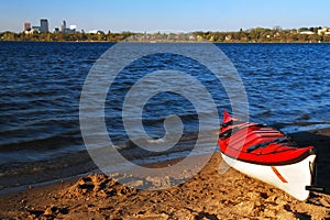 A Lone Red Kayak Awaits a Rider on Lake Calhoun in Minneapolis