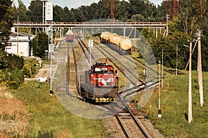 Lone shunting locomotive in red color at marshalling yard