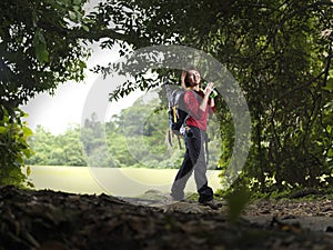Lone single female trekking through the forest