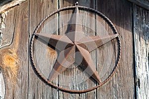 Lone Star sign on a wooden door in Texas