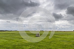 Lone stone at Stonehenge on a cloudy day