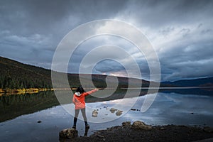 Lone traveler and lake scene