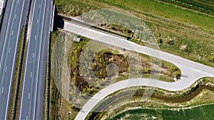 Loneley highway in a rural landscape.