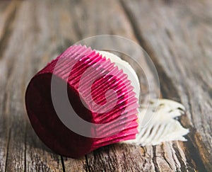 Loneliness muffin on a large wooden table