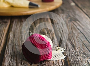 Loneliness muffin on a large wooden table