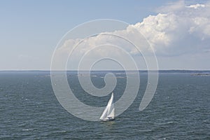 lonelly vessel boat sailing at finland gulf