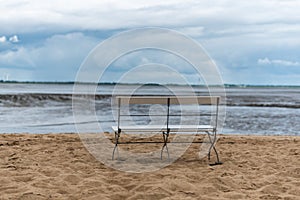 A lonely bank on a beach at ebbe