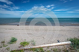 Lonely bathers on the beach of St.Irenee, Quebec