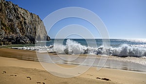 A lonely beach in the Algarve. III